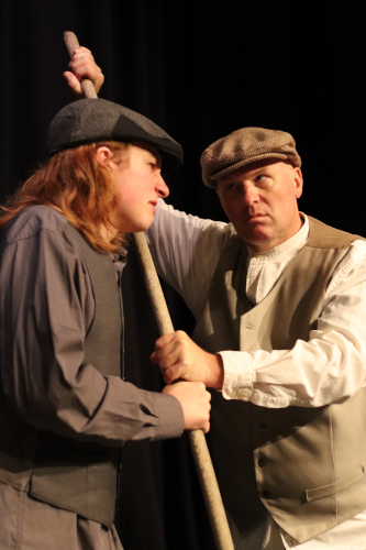 Scene from Crossing Over. Two men fighting